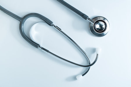Stethoscope for doctor checkup in health medical laboratory table as medical conceptの写真素材