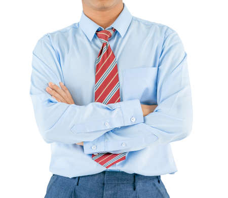 Man in long sleeve shirt wear keeping arms crossed while standing isolate on white backgroundの写真素材