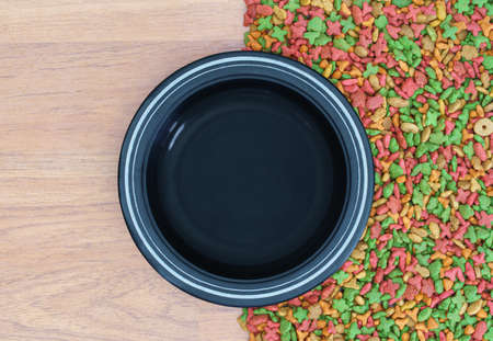 Top view dry food for cat and dog with empty bowlの写真素材