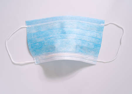 Medical respiratory surgical face mask filter ,Close-up of surgical medical mask on white background