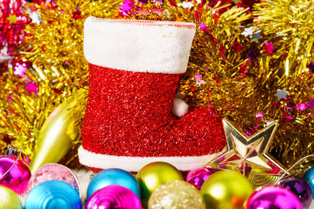 Red Santa claus boot and Christmas ornaments  decorations backgroundの写真素材