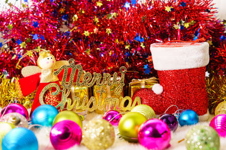 Red Santa claus boot and Christmas ornaments  decorations backgroundの写真素材