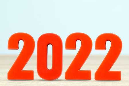 Shot of a number 2022 made of red plastic new year on table with copy spaceの写真素材