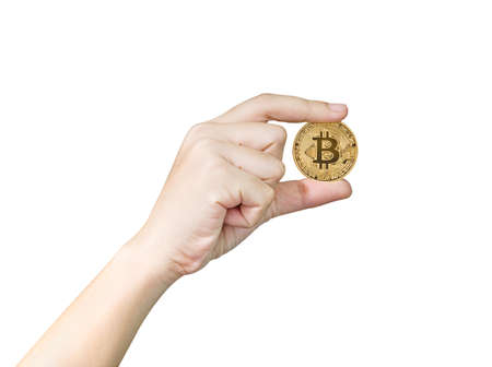 Woman holding some pieces of golden Bitcoin token , Bitcoin is one of the popular cryptocurrencyの写真素材