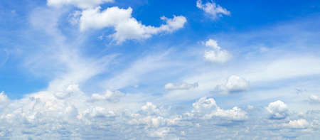 Panoramic fluffy clouds against blue sky ,Panorama fluffy clouds in the blue skyの写真素材