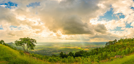 Mountain landscape with sunset on the cloudy sky,Sunset in nature with lighted cloudsの写真素材