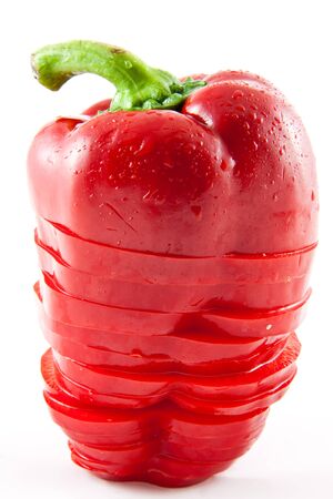 Picture of a sliced standing paprika on a white backgroundの写真素材