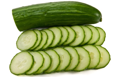 picture of two sliced lines and a half cucumberの写真素材