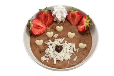 Picture of a dessert with strawberries, chocolate hearts and some creamの写真素材