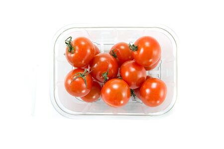 Picture of a bunch of cherry tomatoes in a box from a storeの写真素材