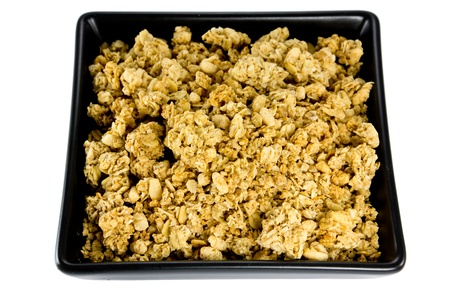 Picture of a black bowl with crunchy musliの写真素材
