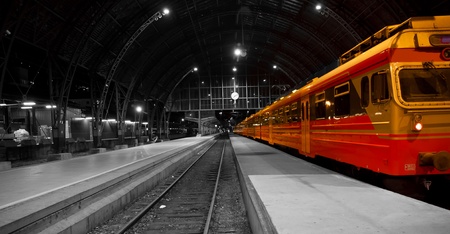 A picture of a train in a railwaystation, black white photo With the train in colorのeditorial素材