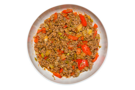 Picture of a mixed dish with minced meat, paprika, spring onions, and onionsの写真素材