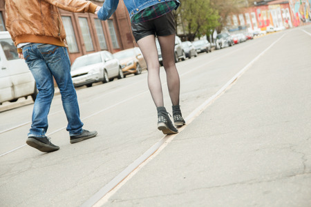 Couple walking on the streetの写真素材