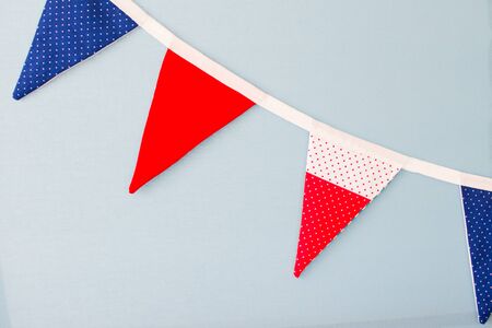 Stretching from the flags hanging on a blue background. Marine decorationsの写真素材