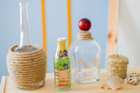 glass bottle with colored sand and the inscription Tunisia. marine decorationsの写真素材