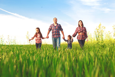 happy family walking togetherの写真素材