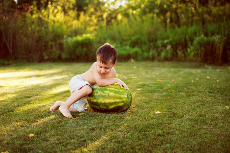 child with a watermelonの写真素材