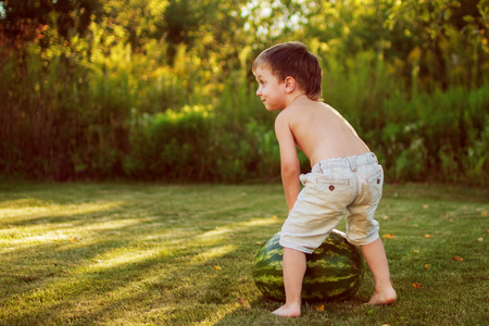 child with a watermelonの写真素材