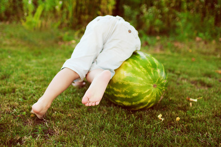 child with a watermelonの写真素材