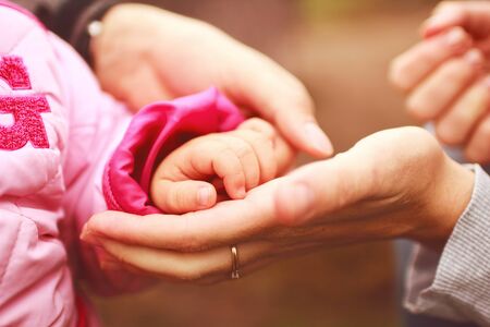 family hands close