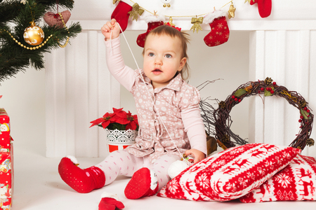 baby in Christmas decorationsの写真素材
