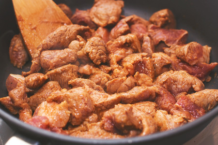 Pork fried in a panの写真素材