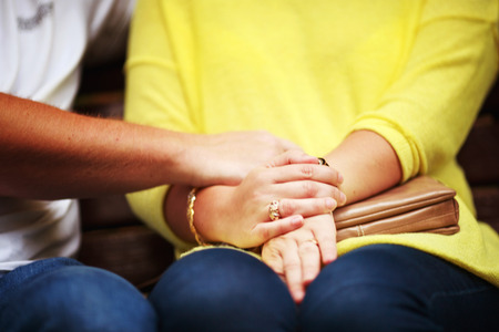 Couple holding each other's handsの写真素材