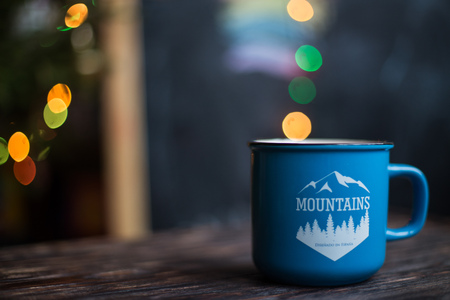 a cup  on the wooden background . Christmas bokehの写真素材