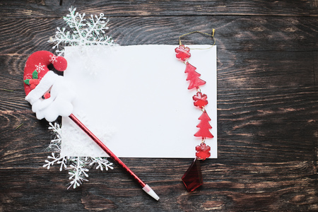 christmas card on a wooden backgroundの写真素材