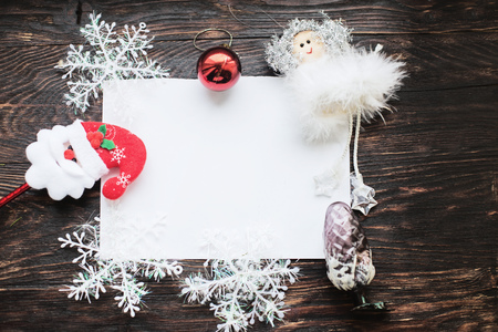christmas card on a wooden backgroundの写真素材