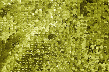 background of gold sequins. shiny sparkling backgroundの写真素材