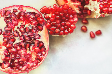 pomegranate seeds close-up.  pomegranate on a light backgroundの写真素材
