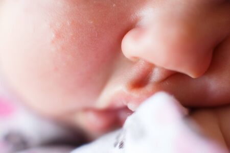 lips of a newborn baby . newborn baby sleeps sweetly