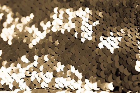 background of gold sequins. shiny sparkling backgroundの写真素材