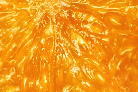 orange slice macro. juicy orange sliced closeupの写真素材