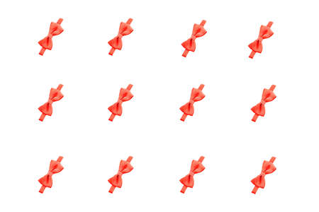 red bow pattern. red bow on a white background.の写真素材