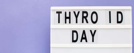 the inscription international thyroid day on purple background. copy space. bannerの写真素材