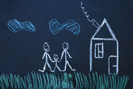 drawing happy homosexual parents with a child on a chalk board. Gay family conceptの写真素材