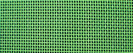 Weaving or mesh pattern background. green plastic texture. bannerの写真素材
