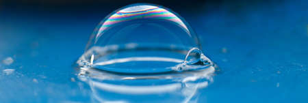 soap bubble close up. abstract blue water backgroundの写真素材