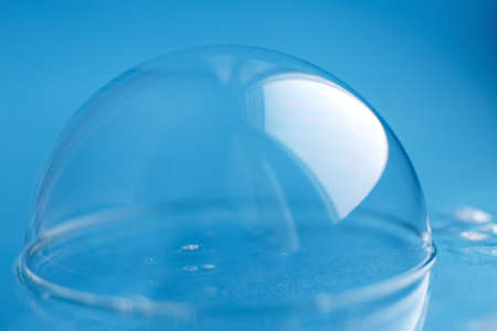 soap bubble close up. abstract blue water backgroundの写真素材