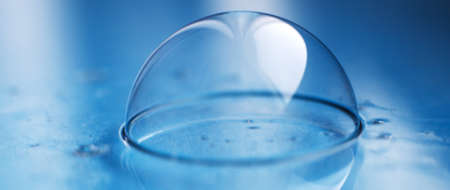 soap bubble close up. abstract blue water backgroundの写真素材