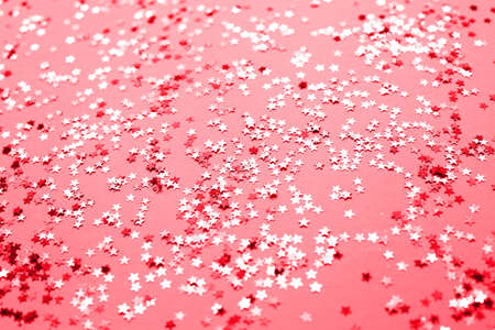 pink sparkles on purple background. Festive backdrop for your projectsの写真素材