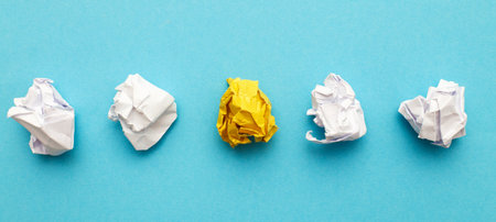 crumpled yelllow paper as a concept creative idea and innovation.の写真素材