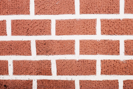 Red grunge brick wall, abstract background texture with old vintage style pattern.の写真素材