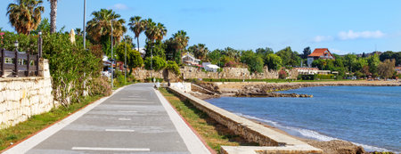 Embankment of Turkish city of Side with views of a beach. Bannerの写真素材