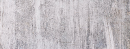 old cracked concrete background. a gray concrete wall closeupの写真素材