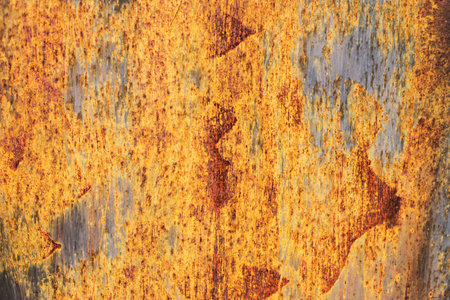 Orande fiery rusty abstract painted metal plate texture and background. texture of grunge old plate...