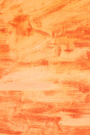 Orange fiery abstract painted metal plate texture and background. Texture of an old plate with...